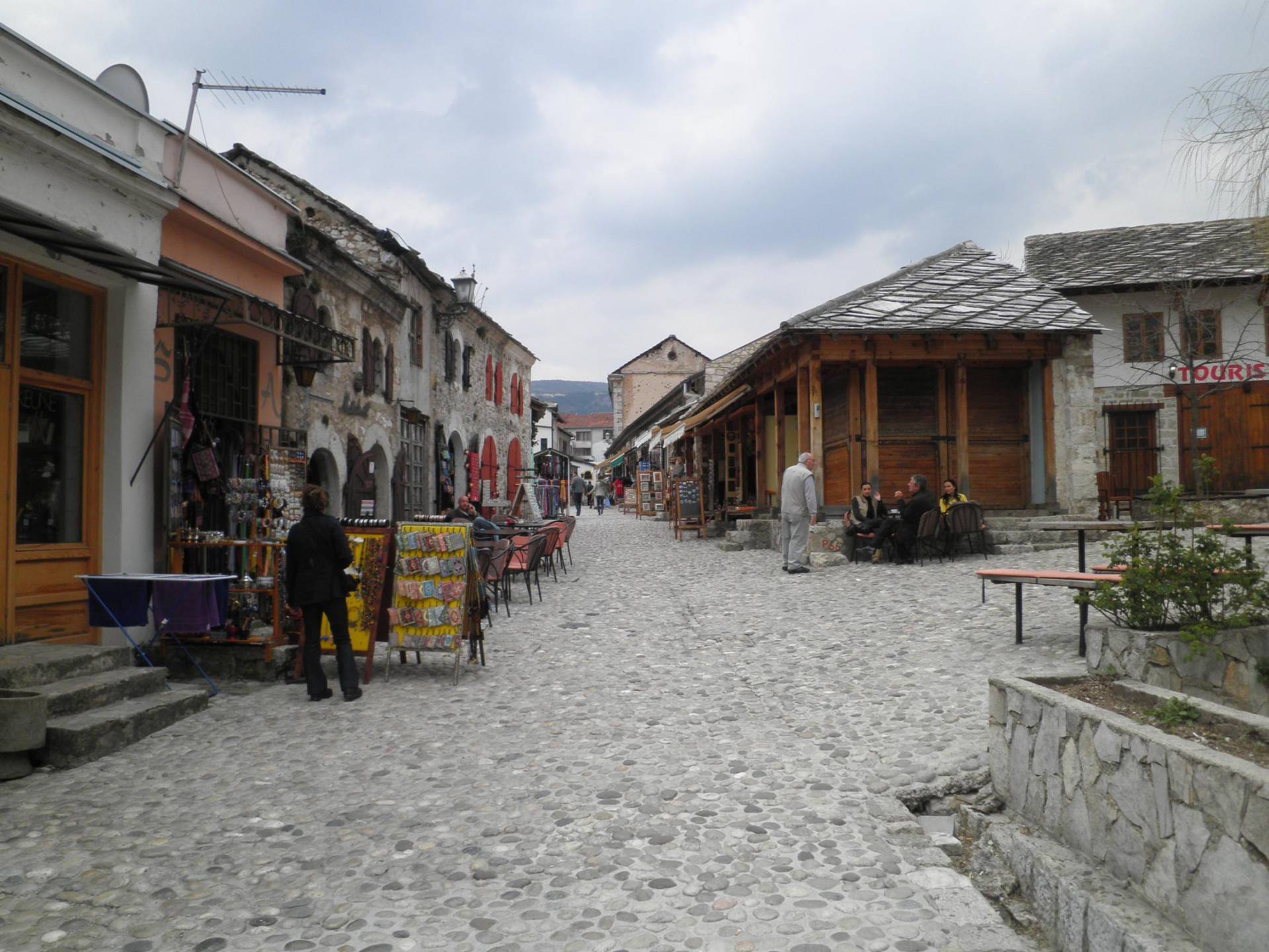 Cobblestone lane and stone-roofed buildings in Mostar Old Town