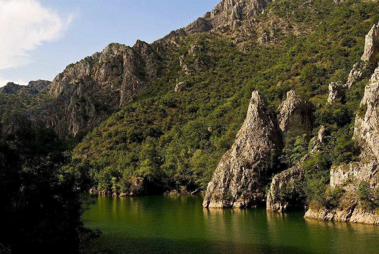 Rocky cliffs and green water in Matka Canyon near Skopje