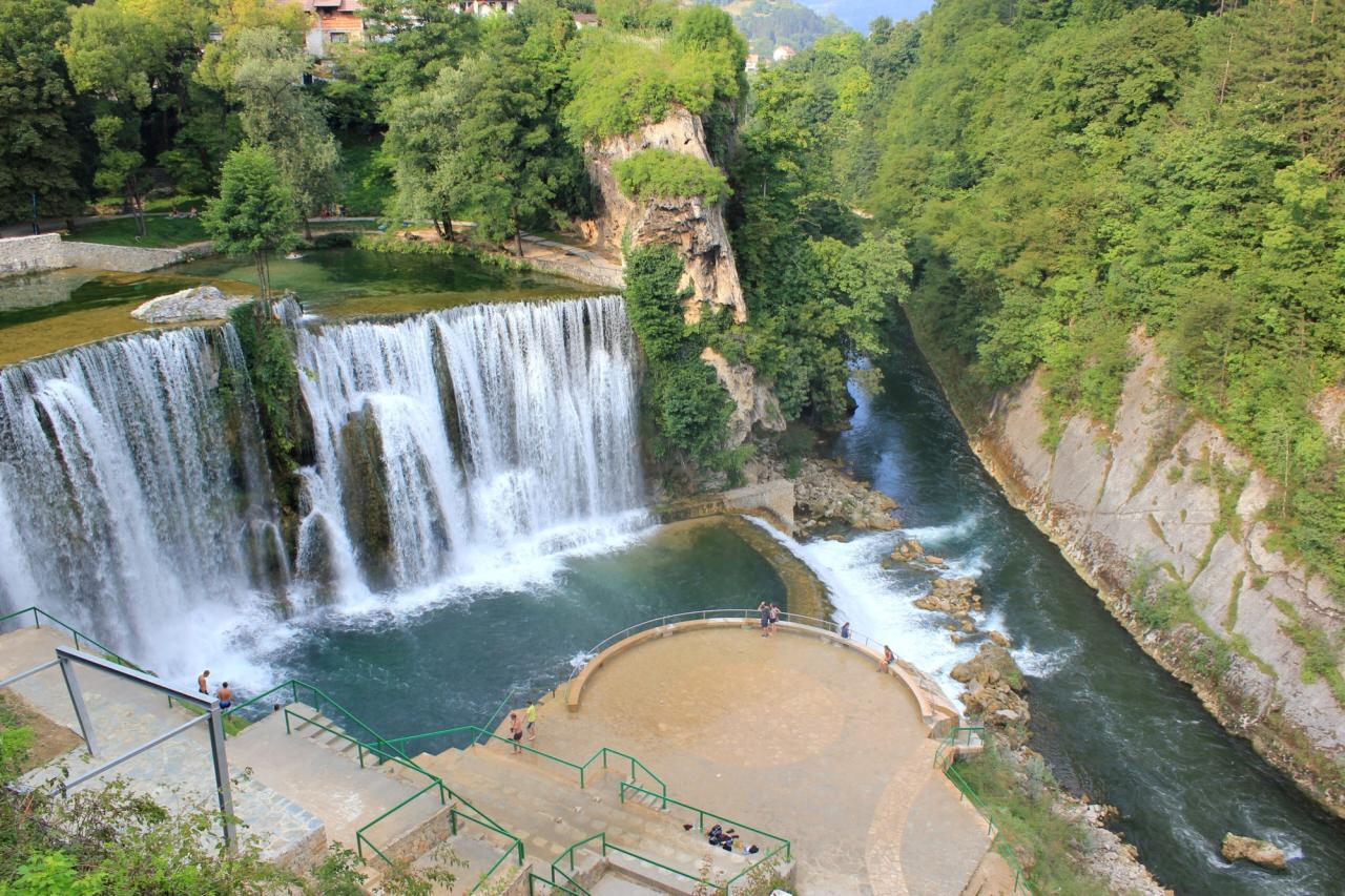 Pliva Waterfall dropping into a wooded gorge below Jajce